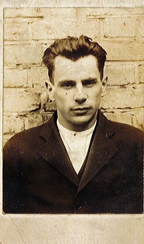 Norman Garfield's mugshot taken by Woodstock Police, 1921.